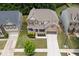 Charming two-story home with a welcoming front porch and well-manicured landscaping at 406 Fernstone Dr, Canton, GA 30114
