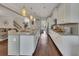 Bright kitchen with an island, modern appliances, and open layout, perfect for culinary enthusiasts and entertaining at 406 Fernstone Dr, Canton, GA 30114