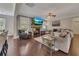 Inviting living room featuring a fireplace, comfortable seating, and natural light for a cozy atmosphere at 406 Fernstone Dr, Canton, GA 30114