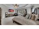 Large Primary bedroom with sitting area and a view from the window at 406 Fernstone Dr, Canton, GA 30114