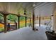 Covered patio featuring ceiling fan, stairs to backyard, and outdoor lounge area at 406 Fernstone Dr, Canton, GA 30114