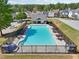 Aerial view of community pool and surrounding townhomes at 4437 Ben Hill Rd, Atlanta, GA 30349