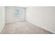Bright bedroom with carpeted floor and a view from the window at 4437 Ben Hill Rd, Atlanta, GA 30349