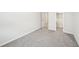 Cozy bedroom with carpet and an open closet at 4437 Ben Hill Rd, Atlanta, GA 30349