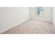 Bedroom with carpeted floor and a window to let in natural light at 4437 Ben Hill Rd, Atlanta, GA 30349