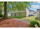 Exterior of the home with grass and mulch at 4437 Ben Hill Rd, Atlanta, GA 30349