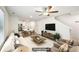 Bright living room features neutral tones, modern furnishings and wood-look floors at 4437 Ben Hill Rd, Atlanta, GA 30349