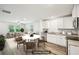 Inviting living room and kitchen area with contemporary décor and natural light at 4437 Ben Hill Rd, Atlanta, GA 30349