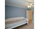 Bedroom with a single bed, blue walls, and bright natural light at 1703 Rifle Sw Rdg, Marietta, GA 30064