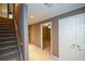 Hallway features carpeted stairs, and access to additional bedrooms and closets at 1703 Rifle Sw Rdg, Marietta, GA 30064