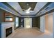 Spacious main bedroom features a fireplace, trey ceiling, and adjoining bathroom with walk-in closet at 1703 Rifle Sw Rdg, Marietta, GA 30064