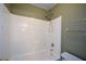 Clean white shower with tiled walls and a clear glass shower door at 1703 Rifle Sw Rdg, Marietta, GA 30064