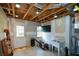 Unfinished space showing exposed rafters, awaiting personalization and customization to suit your unique needs and preferences at 1703 Rifle Sw Rdg, Marietta, GA 30064