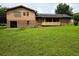 Backyard view of a brick home at 2104 Moon Sw Dr, Conyers, GA 30094