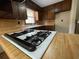 Kitchen featuring laminate countertops and a gas range, offering ample cooking space at 2104 Moon Sw Dr, Conyers, GA 30094