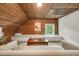 Attic featuring wooden ceiling and sitting area with window views at 235 The Prado N, Atlanta, GA 30309