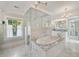 Luxury bathroom with a stand-alone tub, glass enclosed shower, and marble floors at 235 The Prado N, Atlanta, GA 30309