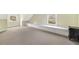 This bedroom has dual windows for natural light with a long seat in the middle at 235 The Prado N, Atlanta, GA 30309