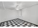 Bedroom with light walls and black and white tile floors at 235 The Prado N, Atlanta, GA 30309