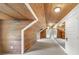 Attic hallway space with wooden walls and mirrored closet doors at 235 The Prado N, Atlanta, GA 30309
