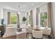 Bright living room with hardwood floors, neutral palette, ample seating and windows at 235 The Prado N, Atlanta, GA 30309