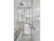 Spa-like shower featuring double shower heads and marble walls and floors at 235 The Prado N, Atlanta, GA 30309