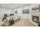 Cozy finished basement with fireplace, plush carpet, and comfortable seating area at 3901 Old Atlanta Station Se Dr, Atlanta, GA 30339