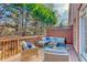 Outdoor deck with seating, a wooded backdrop, and views of the natural surroundings at 3901 Old Atlanta Station Se Dr, Atlanta, GA 30339