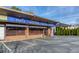 Exterior of Mezza Luna Pasta & Seafood features blue awnings and convenient parking at 3901 Old Atlanta Station Se Dr, Atlanta, GA 30339