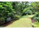 Green backyard with a bench at 453 Carter Se Ave, Atlanta, GA 30317