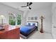 Well-lit bedroom with stylish decor, a large window, and comfortable furnishings at 453 Carter Se Ave, Atlanta, GA 30317