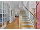 Bright foyer features hardwood floors, staircase, and ample natural light at 453 Carter Se Ave, Atlanta, GA 30317