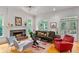 Comfortable living room with stone fireplace, neutral palette, and hardwood floors at 453 Carter Se Ave, Atlanta, GA 30317