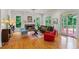 Bright living room features fireplace, hardwood floors, and plenty of natural light at 453 Carter Se Ave, Atlanta, GA 30317