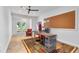 Office with a large desk, a comfortable chair, and French doors leading to the outside at 453 Carter Se Ave, Atlanta, GA 30317