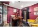 Basement bar area featuring custom wood bar, brick accents, and stylish decor at 486 Haas Se Ave, Atlanta, GA 30316