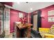 Basement bar area featuring custom wood bar, brick accents, and stylish star decor at 486 Haas Se Ave, Atlanta, GA 30316