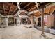 Partially finished basement with exposed ductwork, brick column, and sealed walls at 486 Haas Se Ave, Atlanta, GA 30316