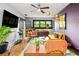 Inviting living room with hardwood floors, stylish seating, and ample natural light for relaxation and comfort at 486 Haas Se Ave, Atlanta, GA 30316