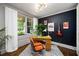 Bright home office with a desk, modern lighting, stylish decor, and a view of the front porch at 486 Haas Se Ave, Atlanta, GA 30316