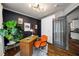 Well-lit home office featuring a desk, modern lighting, stylish decor, and ample storage at 486 Haas Se Ave, Atlanta, GA 30316