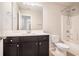 Bright bathroom featuring a white vanity countertop and a shower-tub combination at 85 Brushed Ives Ct, Lawrenceville, GA 30045