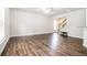 Spacious living room featuring hardwood floors, ample natural light, staircase, and room for entertaining at 85 Brushed Ives Ct, Lawrenceville, GA 30045