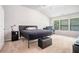 Spacious main bedroom featuring large windows and plush carpet at 85 Brushed Ives Ct, Lawrenceville, GA 30045