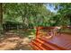 Relaxing backyard deck space, ideal for outdoor dining and entertaining with lush greenery at 901 Winfield Se Ave, Atlanta, GA 30316
