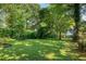 Expansive backyard with mature trees offering shade and a serene atmosphere for outdoor living at 901 Winfield Se Ave, Atlanta, GA 30316