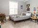 Bedroom with a carpeted floor, bright window, and cozy bed at 901 Winfield Se Ave, Atlanta, GA 30316
