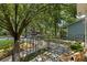 Inviting front porch with seating, perfect for enjoying the lush, green neighborhood views at 901 Winfield Se Ave, Atlanta, GA 30316