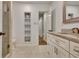 Tastefully updated bathroom with a frameless shower and granite countertops at 104 Hidden Springs Ln, Peachtree City, GA 30269