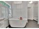 Elegant bathroom with a standalone tub, providing a serene and spa-like experience at 104 Hidden Springs Ln, Peachtree City, GA 30269